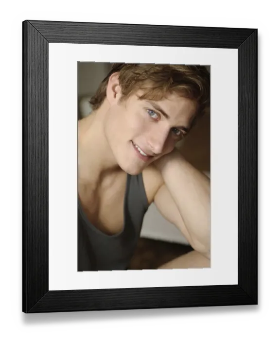 Framed Print : Smiling young man wearing underwear, portrait Framed Print : Smiling young man wearing underwear, portrait