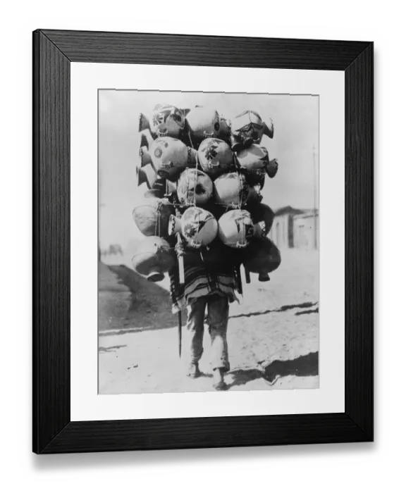 Framed Print : Overload. 30th April 1934: An Indian cargador 