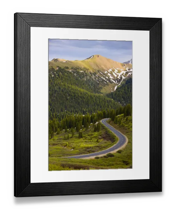Framed Print : Scenic of curvy road in a mountain valley Framed Print : Scenic of curvy road in a mountain valley