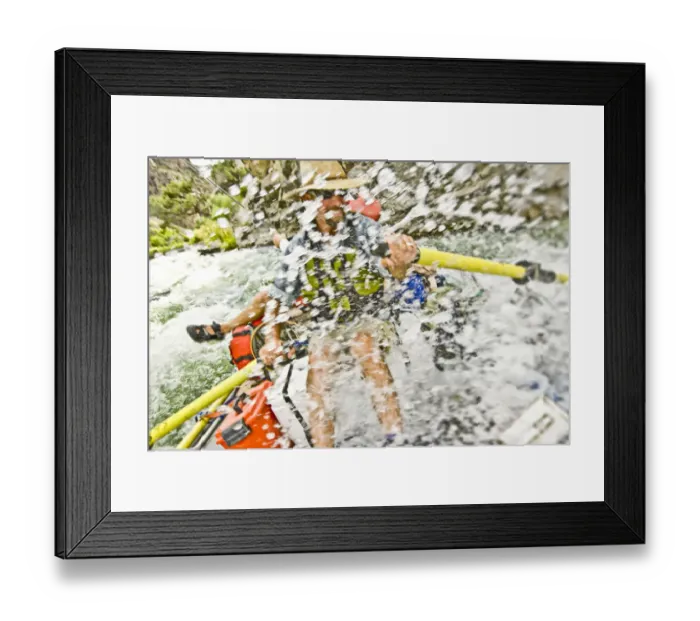 Framed Print : Man rowing raft through splashing rapids Framed Print : Man rowing raft through splashing rapids
