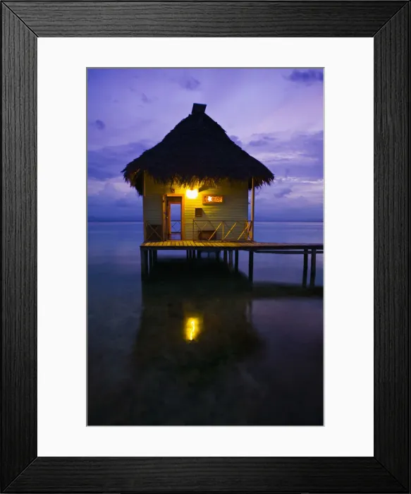 Framed Print : Thatch roofed hut at end of dock, dusk Framed Print : Thatch roofed hut at end of dock, dusk