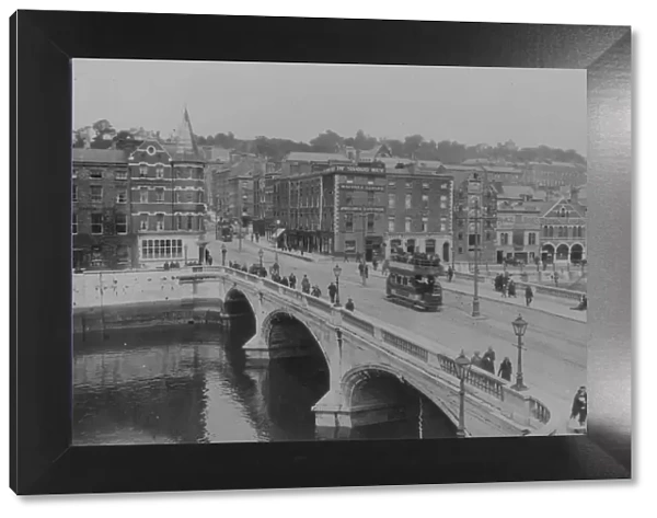 Cork City. circa 1930: A tram crosses the bridge in Cork City, Ireland