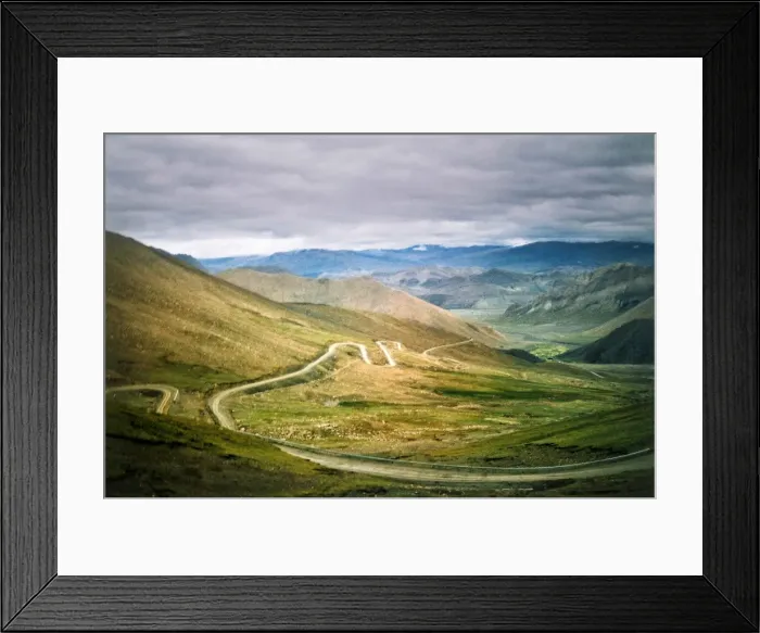 Framed Print : Winding mountain road in storm in Himalayas Tibet Framed Print : Winding mountain road in storm in Himalayas Tibet