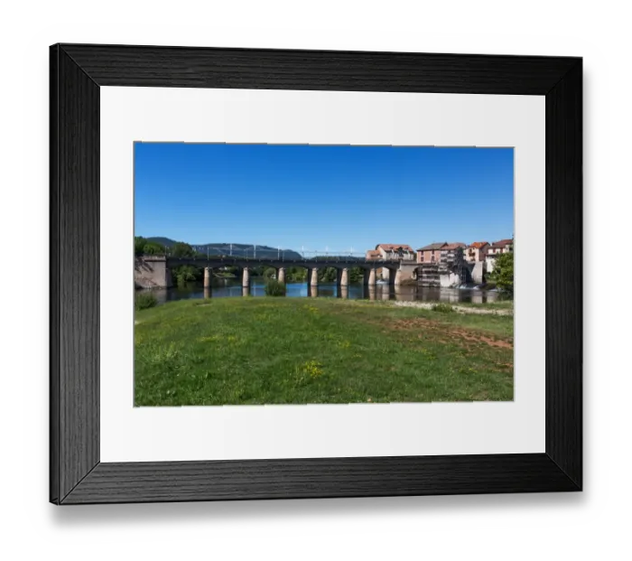 Framed Print : Millau / France old town at Tarn River - The Millau Viaduct (for what this city is mostly known) in background Framed Print : Millau / France old town at Tarn River - The Millau Viaduct (for what this city is mostly known) in background