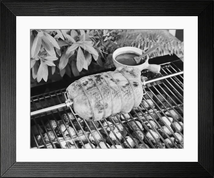 Framed Print : Spit roasting of chicken on barbecue grill Framed Print : Spit roasting of chicken on barbecue grill