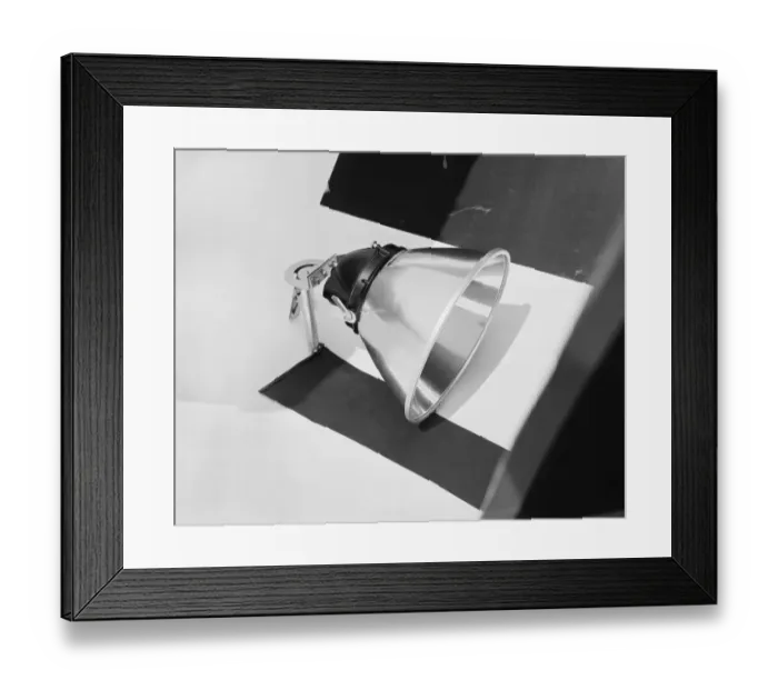 Framed Print : Spotlight against white background, close-up Framed Print : Spotlight against white background, close-up