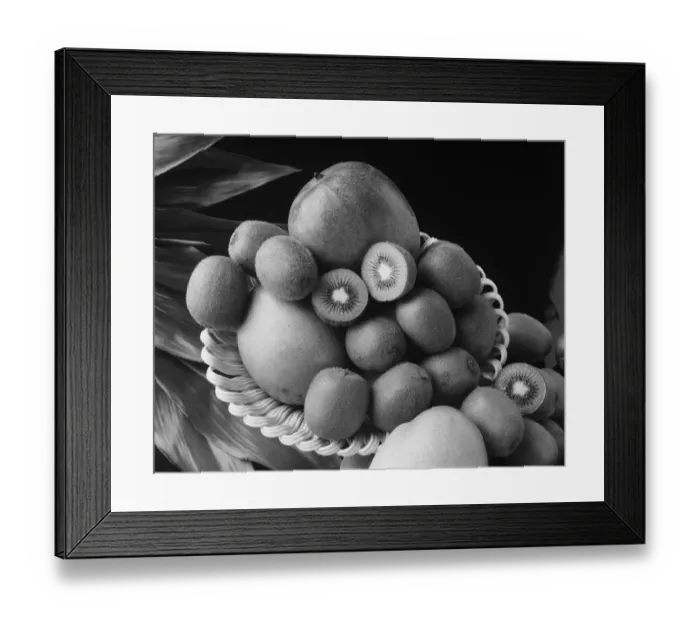 Framed Print : Kiwi fruits and mangos on tray against black background Framed Print : Kiwi fruits and mangos on tray against black background