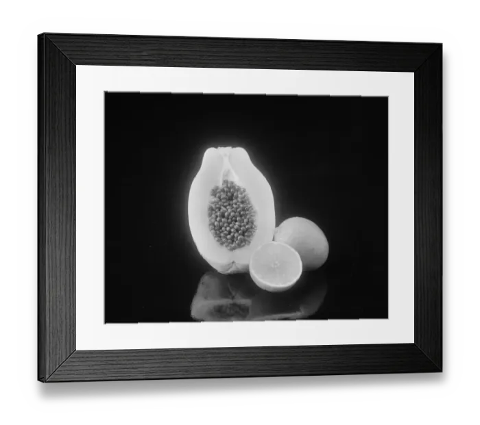 Framed Print : Half cut papaya and lemon on black background Framed Print : Half cut papaya and lemon on black background