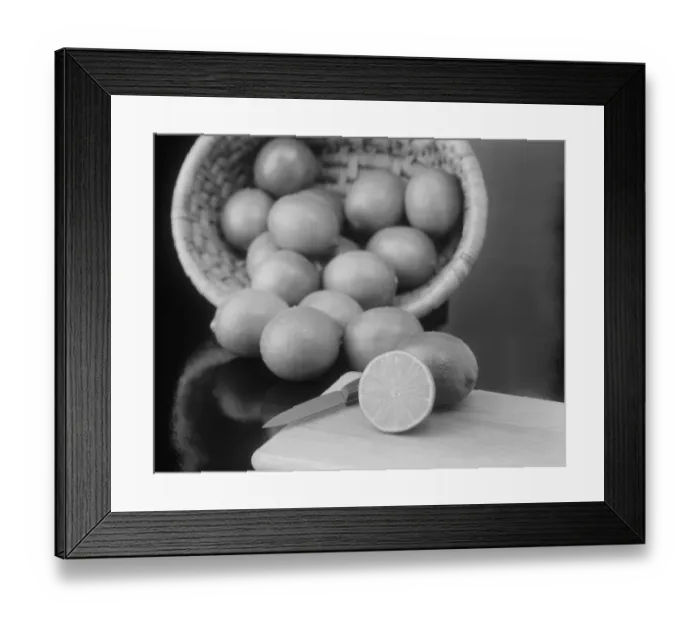 Framed Print : Lemon in basket, whole and half cut on chopping board with knife Framed Print : Lemon in basket, whole and half cut on chopping board with knife