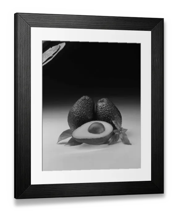 Framed Print : Avocados with leaf on white background, close-up Framed Print : Avocados with leaf on white background, close-up