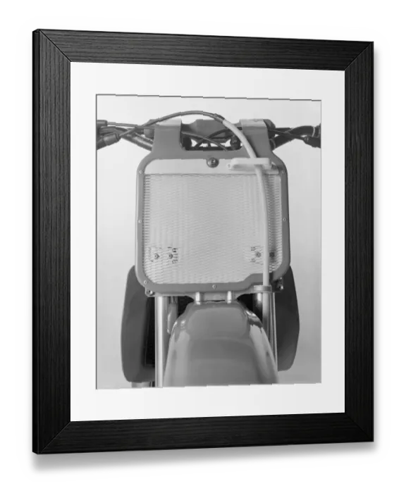 Framed Print : Motorbike against white background, close-up Framed Print : Motorbike against white background, close-up