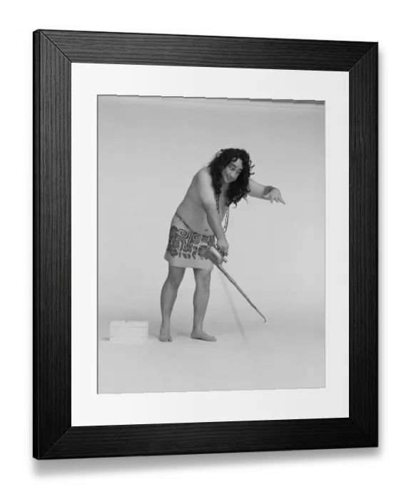Framed Print : Man holding oil can against white background Framed Print : Man holding oil can against white background