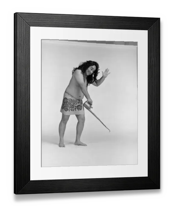 Framed Print : Man holding oil can against white background Framed Print : Man holding oil can against white background