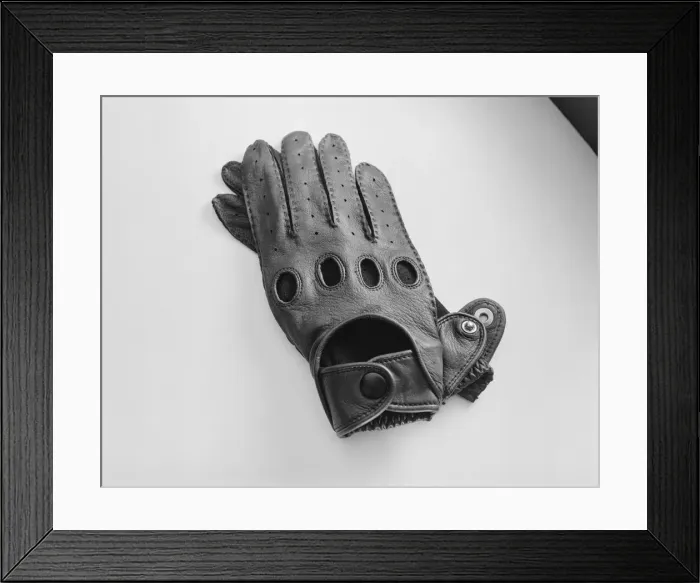 Framed Print : Leather gloves on white background, close-up Framed Print : Leather gloves on white background, close-up