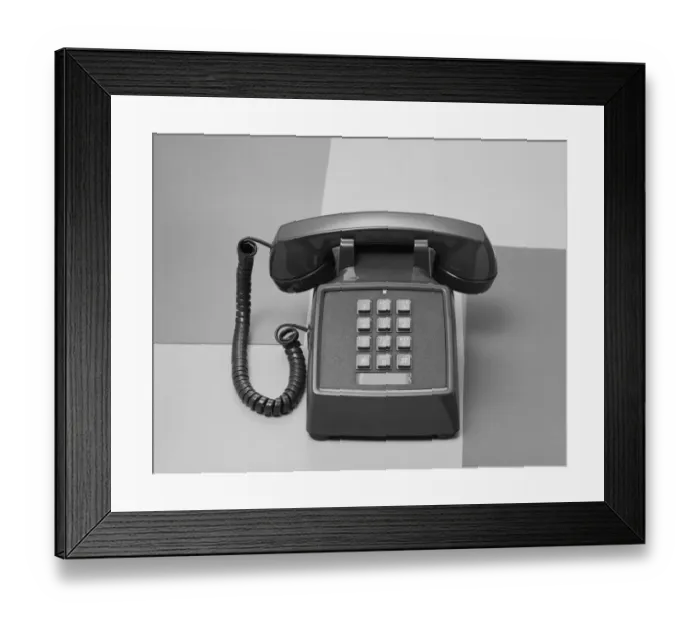 Framed Print : Telephone on white background, close-up Framed Print : Telephone on white background, close-up