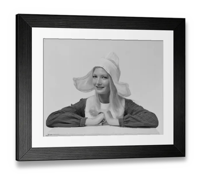 Framed Print : Young woman wearing dress hat, smiling, portrait Framed Print : Young woman wearing dress hat, smiling, portrait