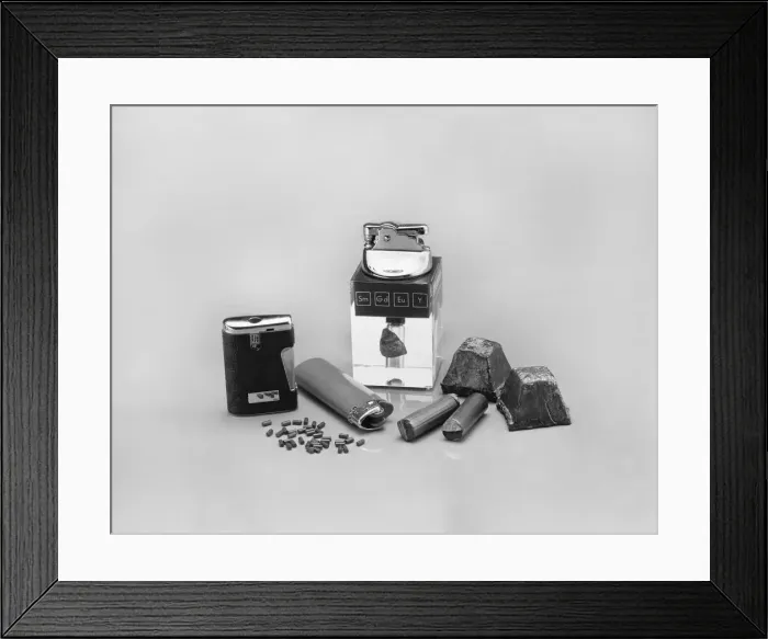 Framed Print : Cigarette lighters with flints on white background Framed Print : Cigarette lighters with flints on white background