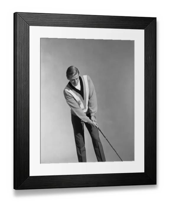 Framed Print : Man holding golf club
