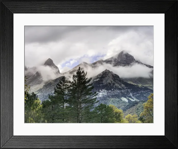 Framed Print : Summits of high mountains with snow in autumn and clouds of storm, in a valley of the Pyrenees Framed Print : Summits of high mountains with snow in autumn and clouds of storm, in a valley of the Pyrenees