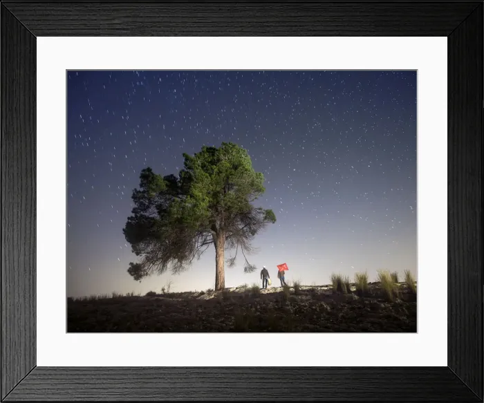 Framed Print : Two persons camiando with suitcases in the night Framed Print : Two persons camiando with suitcases in the night