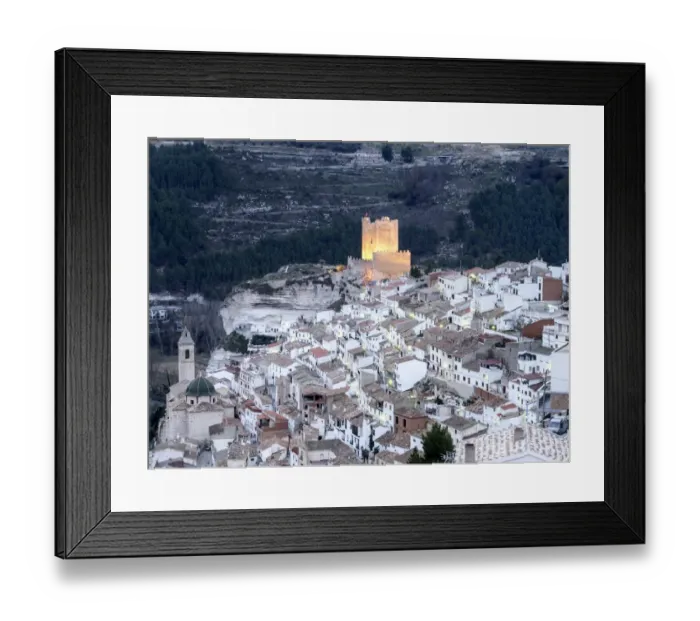 Framed Print : Tourist town of Alcala de Jucar with lamps lit streets Framed Print : Tourist town of Alcala de Jucar with lamps lit streets