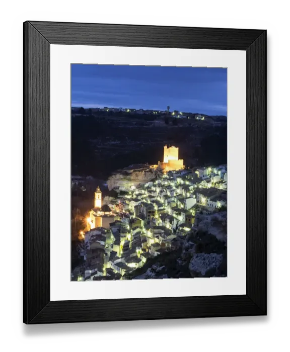 Framed Print : Tourist town of Alcala de Jucar with lamps lit streets Framed Print : Tourist town of Alcala de Jucar with lamps lit streets