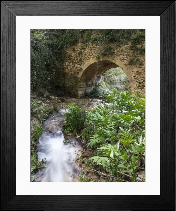 Framed Print : Roman bridge into a ravine in a mountain stream Framed Print : Roman bridge into a ravine in a mountain stream