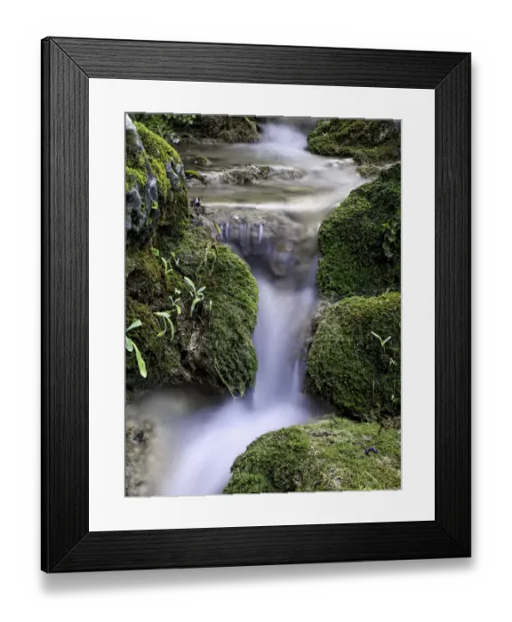 Framed Print : Rushing water with moss green silk effect between Framed Print : Rushing water with moss green silk effect between