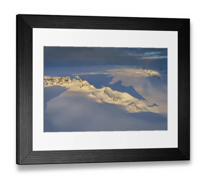 Framed Print : Aerial view of mountains and cliffs on a glacier, Iceland Framed Print : Aerial view of mountains and cliffs on a glacier, Iceland