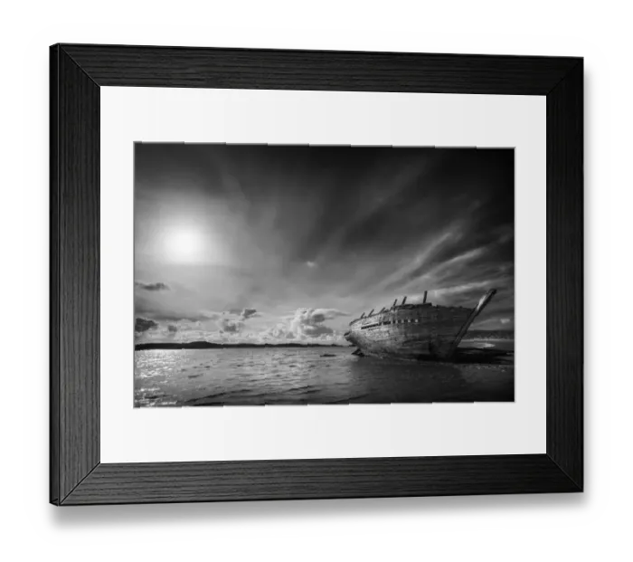Framed Print : Shipwreck on beach under clouds Framed Print : Shipwreck on beach under clouds