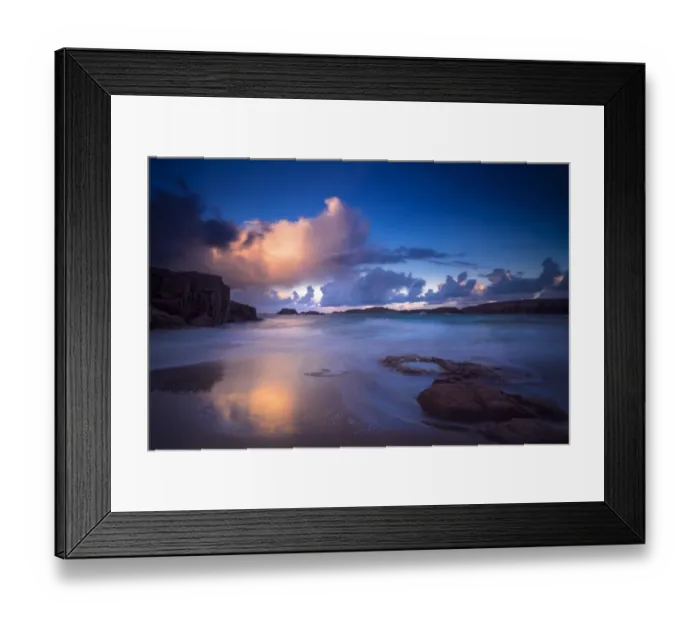 Framed Print : Calm waves on beach at sunset