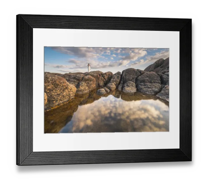 Framed Print : Fanad Head (FAanaid) lighthouse, County Donegal, Ulster region, Ireland, Europe. Sky reflected into the water between the rocks Framed Print : Fanad Head (FAanaid) lighthouse, County Donegal, Ulster region, Ireland, Europe. Sky reflected into the water between the rocks