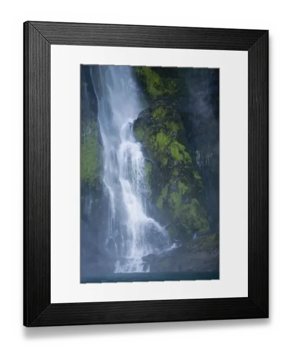 Framed Print : New Zealand, South Island, waterfall flowing into Milford Sound, dawn Framed Print : New Zealand, South Island, waterfall flowing into Milford Sound, dawn