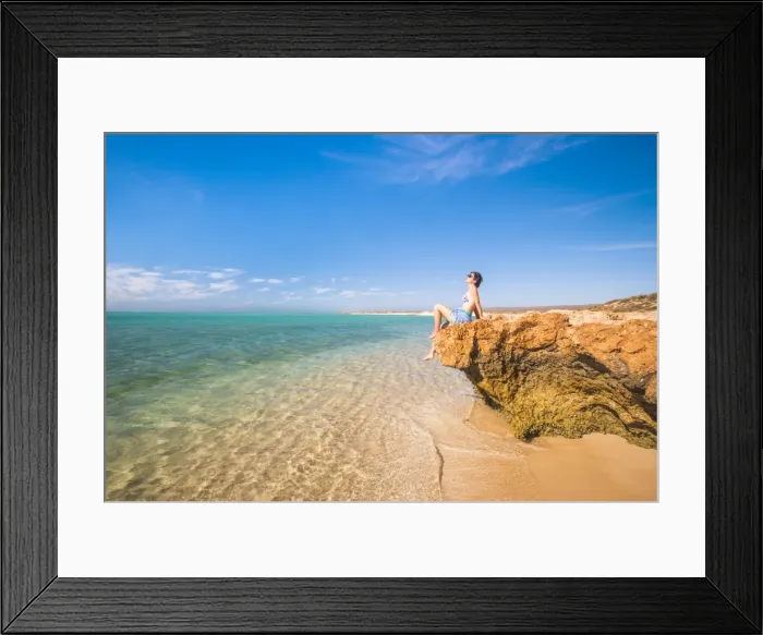 Framed Print : Woman with sarong and straw hat sunbathing at Osprey Bay, Cape Range National Park, Exmouth, Western Australia Framed Print : Woman with sarong and straw hat sunbathing at Osprey Bay, Cape Range National Park, Exmouth, Western Australia