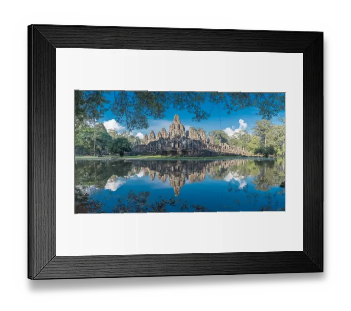Framed Print : Bayon Temple reflection. Bayon Temple was built as the official state temple of the Mahayana Buddhist King Jayavarman VII
