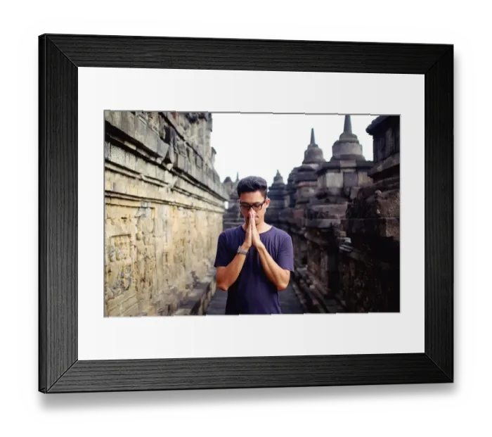 Framed Print : Asian man in blue tshirt at Borobudur temple Framed Print : Asian man in blue tshirt at Borobudur temple