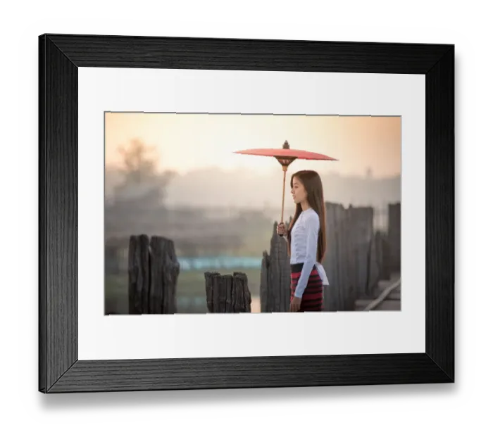 Framed Print : Beautiful woman holding traditional red umbrella and walking on U Bein Bridge, Myanmar Framed Print : Beautiful woman holding traditional red umbrella and walking on U Bein Bridge, Myanmar