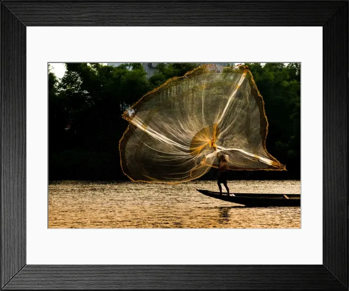Framed Print : Fisherman catch fish in the river in Hue, Vietnam Framed Print : Fisherman catch fish in the river in Hue, Vietnam
