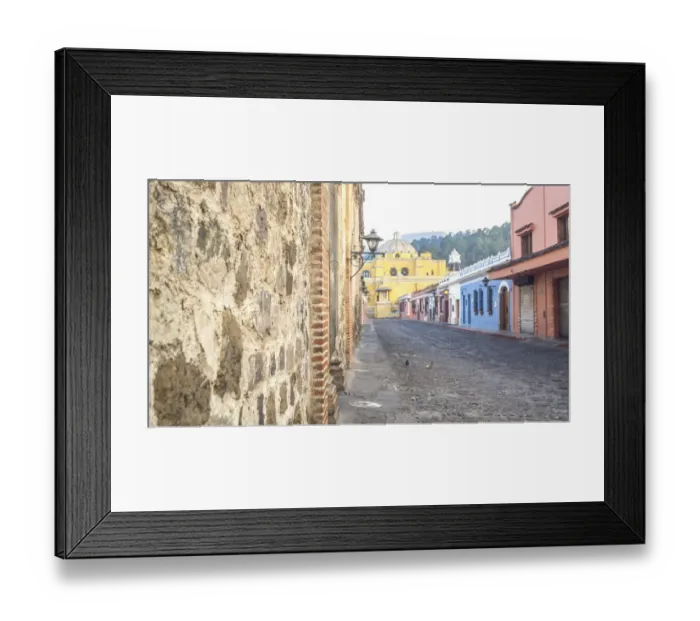 Framed Print : Cobblestone street of Antigua, La Merced Church on background Framed Print : Cobblestone street of Antigua, La Merced Church on background