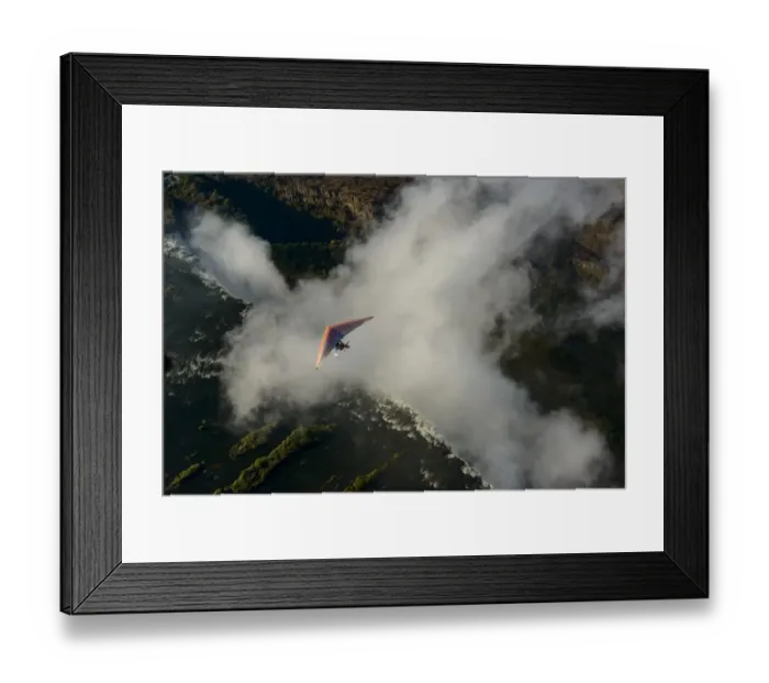 Framed Print : Aerial view of a micorlight (ultralight) flying over the Zambezi River and Victoria Falls. Livingstone. Zambia Framed Print : Aerial view of a micorlight (ultralight) flying over the Zambezi River and Victoria Falls. Livingstone. Zambia
