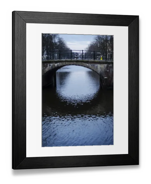 Framed Print : A Canal Bridge in the Capital City of Amsterdam, Netherlands Framed Print : A Canal Bridge in the Capital City of Amsterdam, Netherlands
