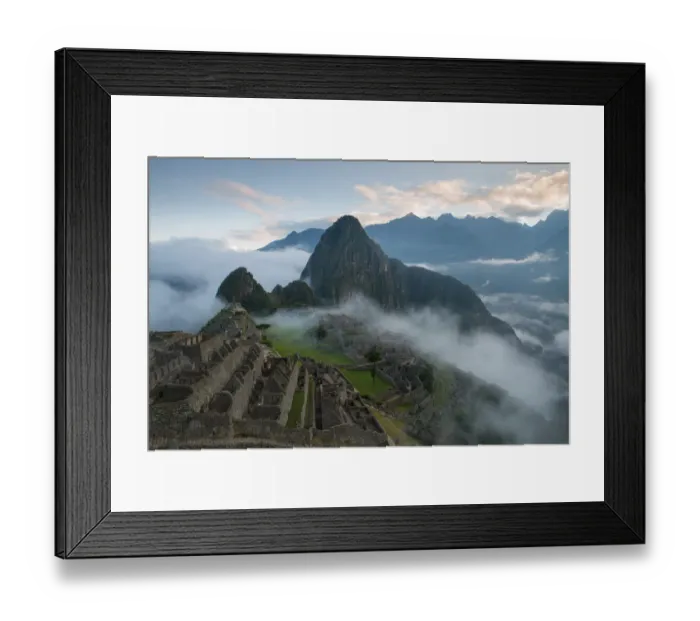 Framed Print : Machu Picchu at Sunrise with rolling fog and clouds
