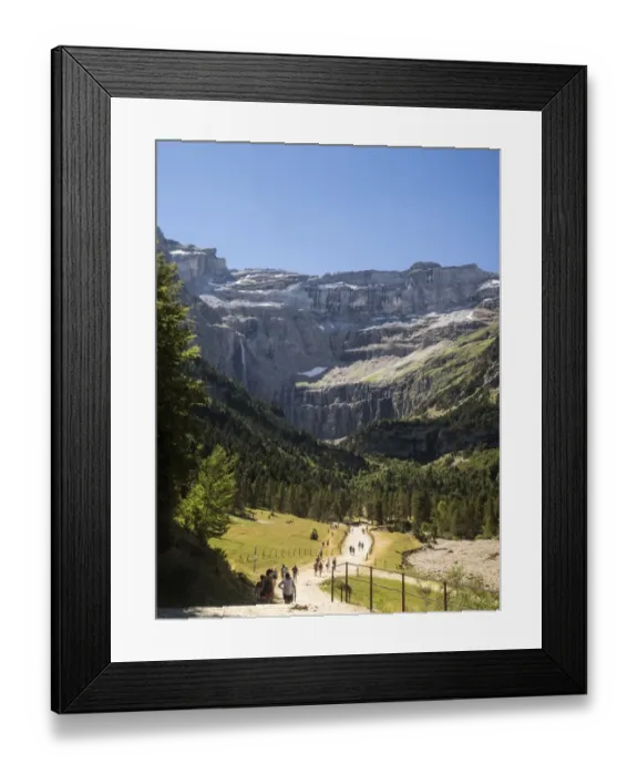 Framed Print : Persons walking along the cirque of Gavarnie. Pyrenees. France. World Heritage by UNESCO, the great waterfall Framed Print : Persons walking along the cirque of Gavarnie. Pyrenees. France. World Heritage by UNESCO, the great waterfall