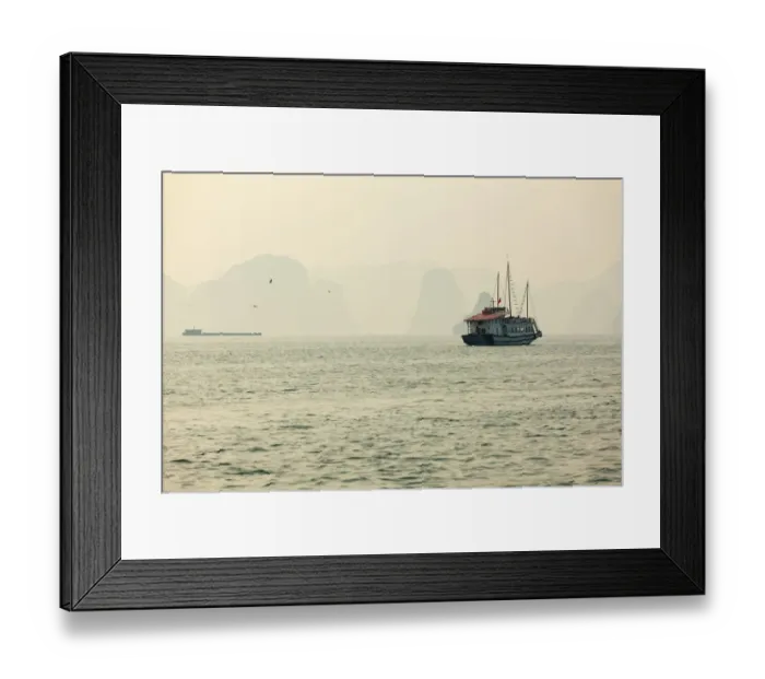 Framed Print : boats cruising around karst in the world famous place halong bay in north Vietnam Framed Print : boats cruising around karst in the world famous place halong bay in north Vietnam