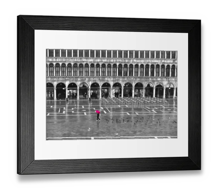 Framed Print : One person with a red umbrella crossing the St Marks Square by a rainy day in winter in Venice, Italy Framed Print : One person with a red umbrella crossing the St Marks Square by a rainy day in winter in Venice, Italy