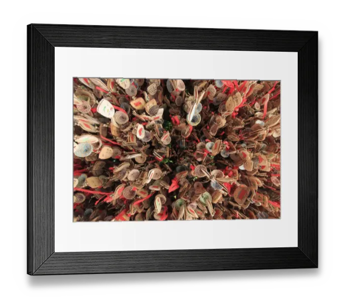 Framed Print : Close up of hand written prayers hanging on a roof