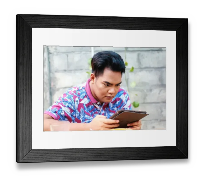 Framed Print : Browsing on tablet Framed Print : Browsing on tablet