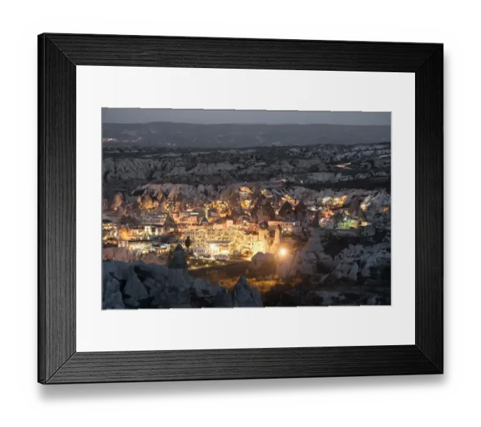 Framed Print : Goreme, View of cliff dwelling and village at nigh Framed Print : Goreme, View of cliff dwelling and village at nigh