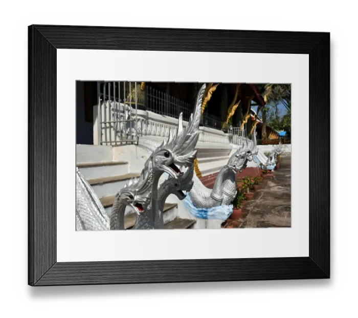 Framed Print : Silver gilding nagas buddhist temple Laos Framed Print : Silver gilding nagas buddhist temple Laos