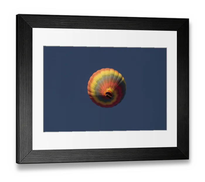 Framed Print : Hot air balloon flying over rock landscape at Cappadocia Turkey Framed Print : Hot air balloon flying over rock landscape at Cappadocia Turkey